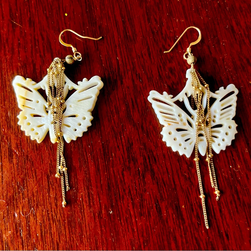 Gold tone and shell butterfly dangle earrings